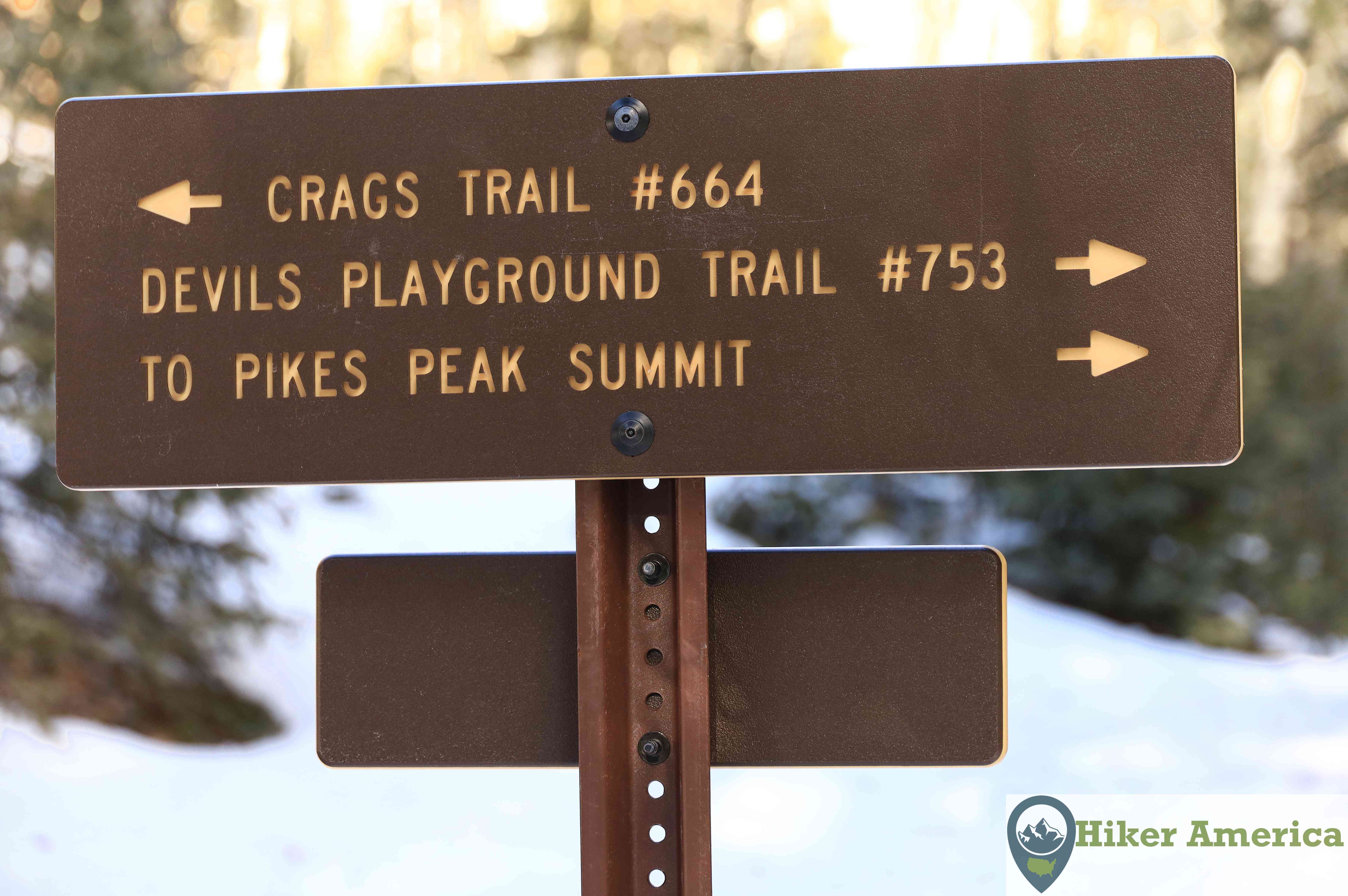 A sign at the junction of the Crags Trail and the Devils Playground Trail.
